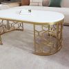 47.2" Modern Oval Coffee Table with Cut-Out Pattern Gold Metal Stainless Steel Frame and Smooth White Tabletop