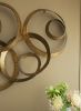 38.5” Seretha Gold Leaf Iron Wall Decor with Abstract Design and Round Geometric Shape