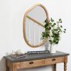 Irregular Wall Mirror with Asymmetrical Wood Frame Design and Wavy Accent Pattern