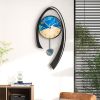 24.8" Multi-Color Modern Acrylic Wall Decor Clock with Unique Pendulum Swing Design, Silent Movement, Matte Textured Surface and Arabic Numbers